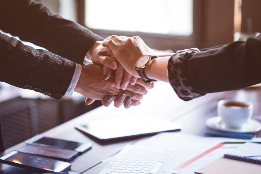 Two people shaking hands