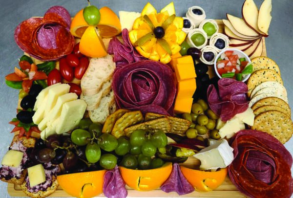 Charcuterie board with cheese, fruit and meats