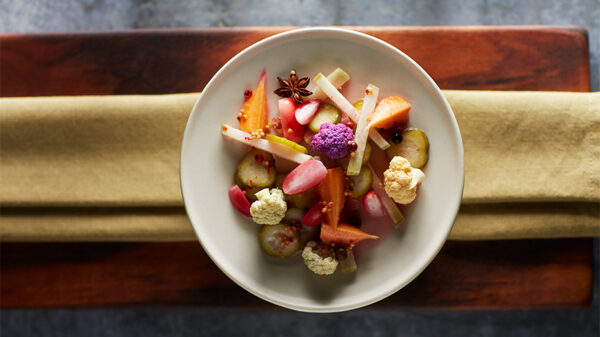 Asian quick-pickled vegetables on a white plate