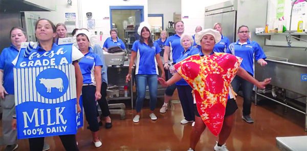 School nutrition workers in food costumes