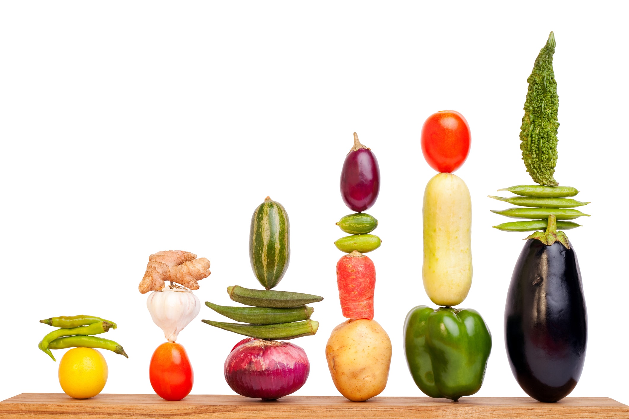 Conceptual bar graph made up of assorted vegetables