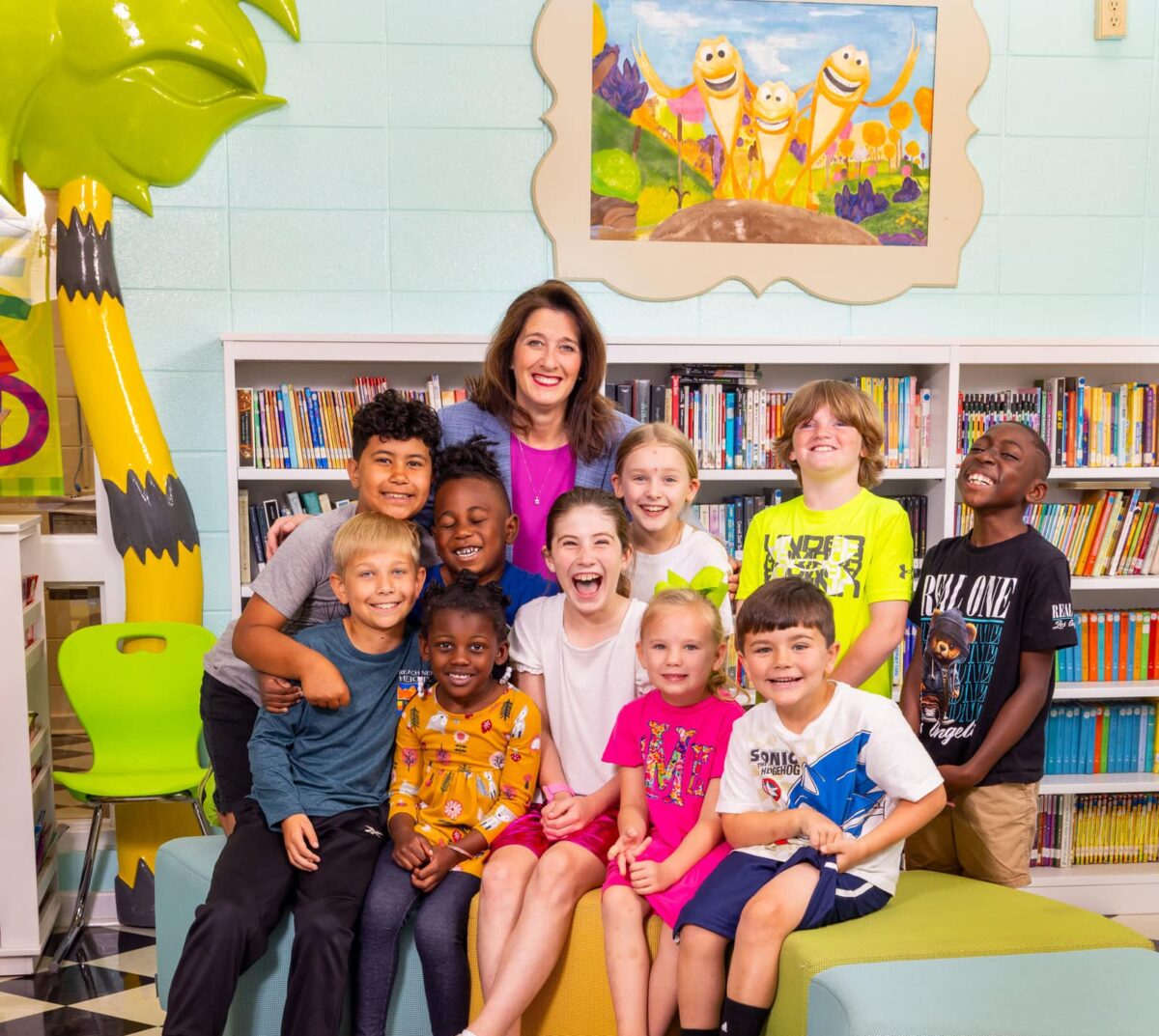 Stephanie Dillard posing for a photo with students