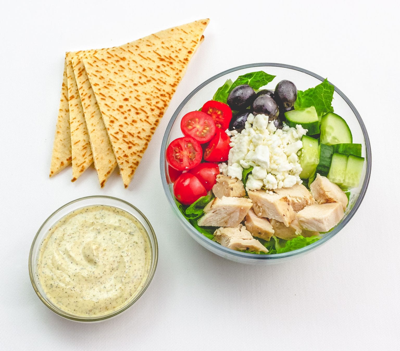 Greek salad with creamy herb yogurt dressing